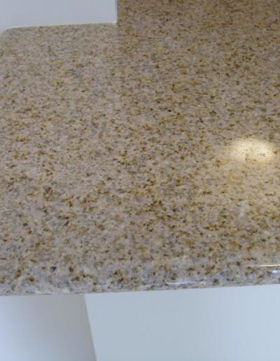 Granite countertop with rounded edge detail.